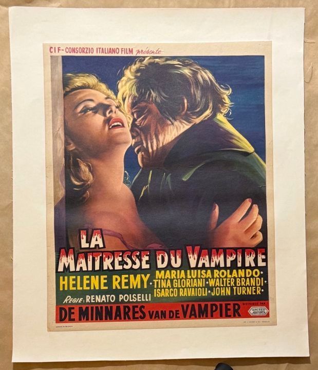 Vintage movie poster for 'La Maitresse du Vampire' featuring a woman and a man on a beige background.